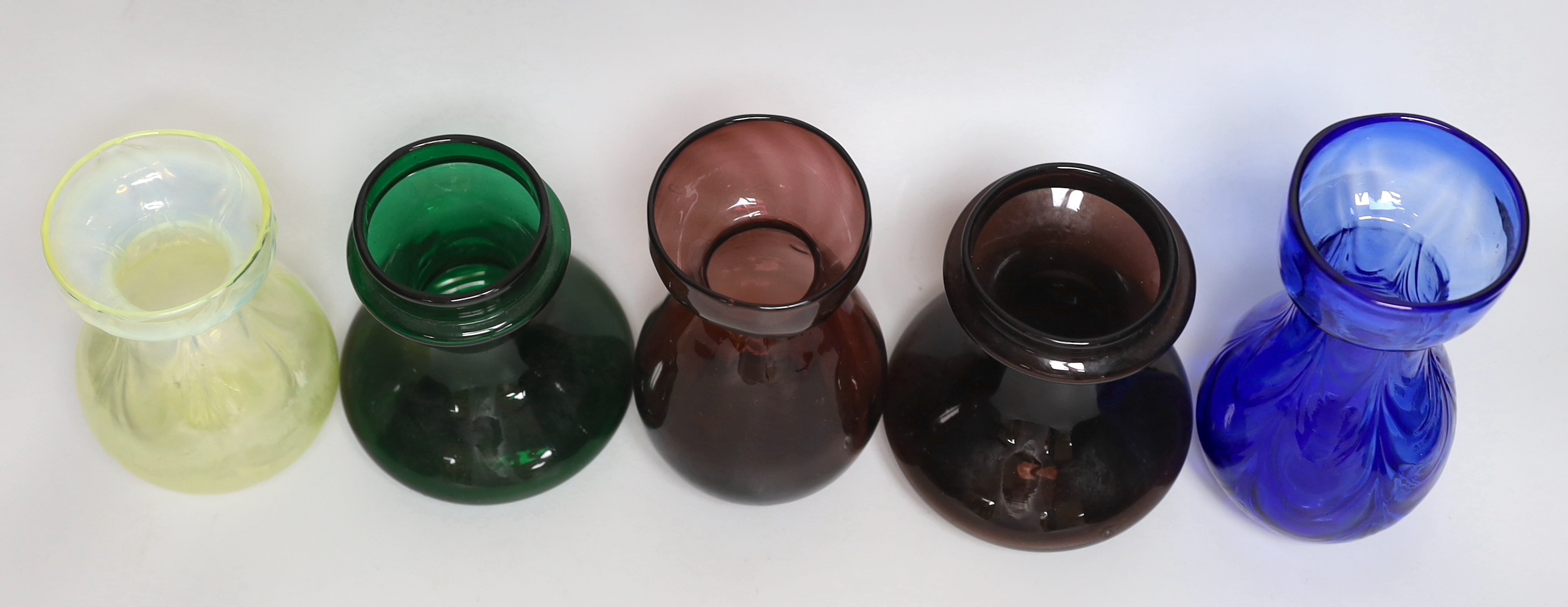 Five coloured glass bulb vases including one opalescent, largest 18cm high